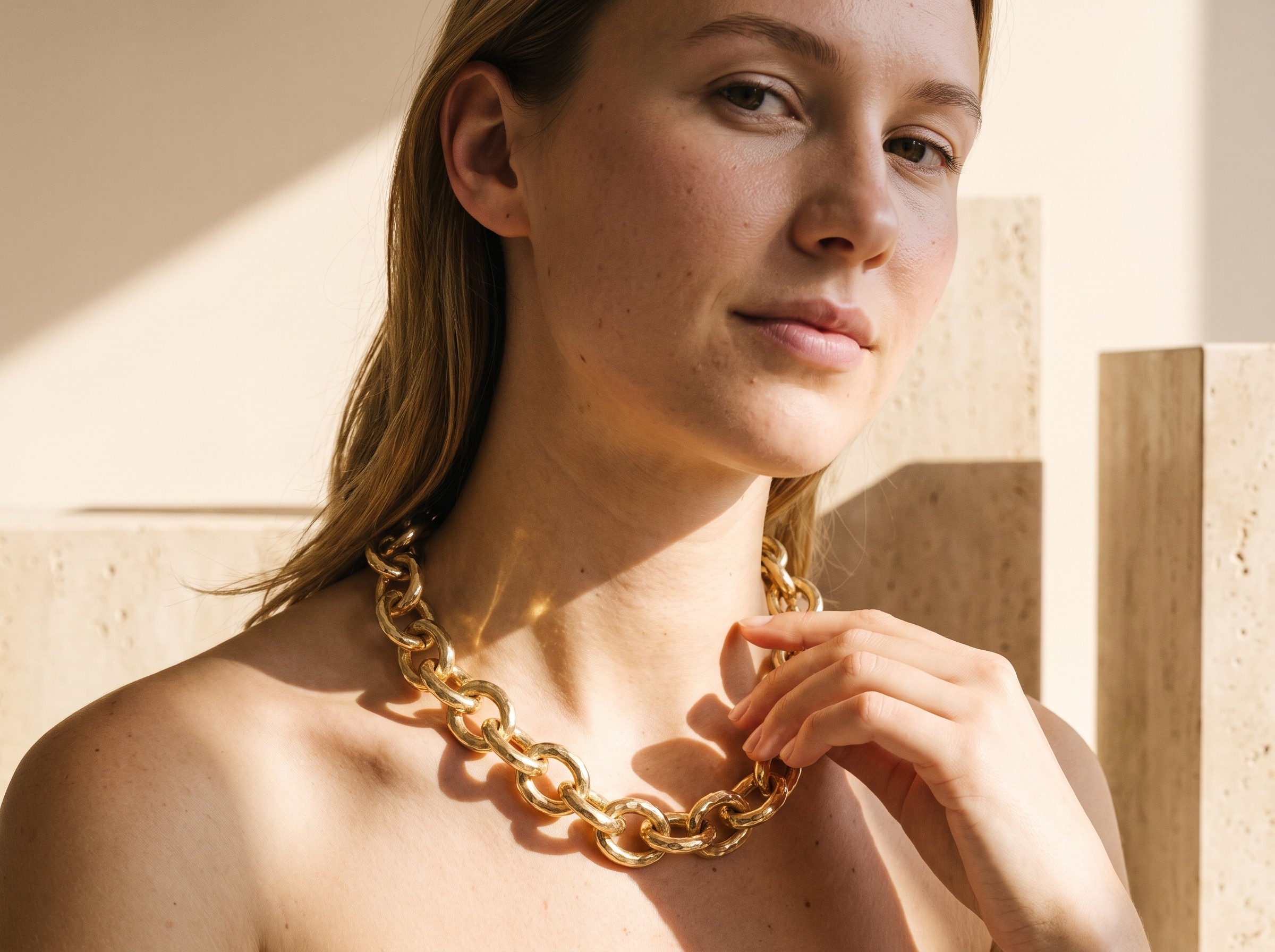 AI model wearing gold chain necklace, editorial studio