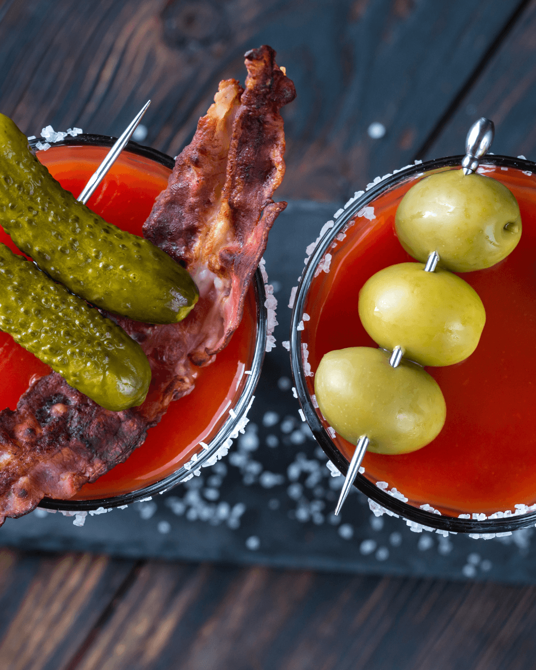 A man in an open shirt stands in a dry, grassy field