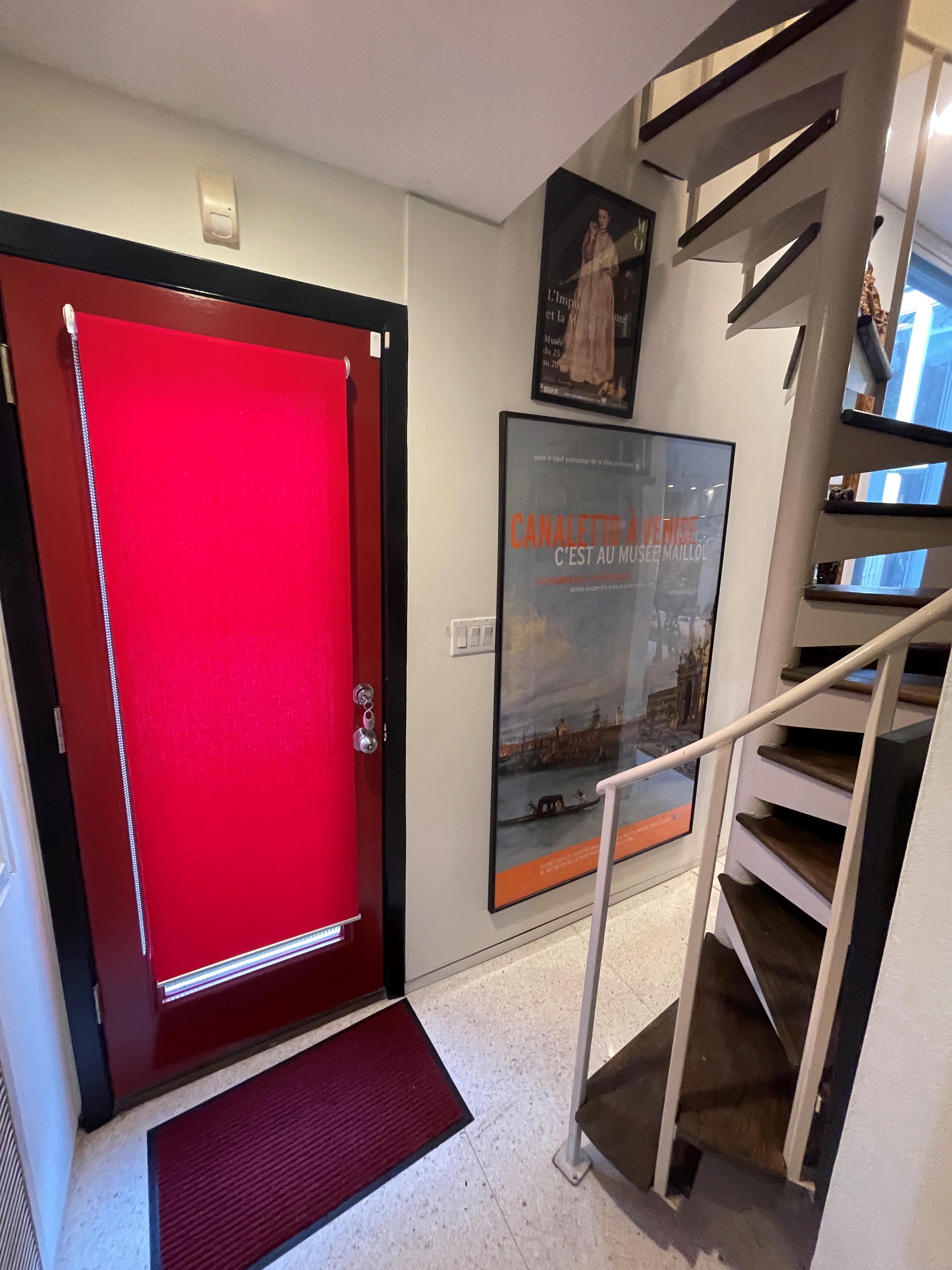 Through-the-floor home elevator installed where a spiral staircase used to be