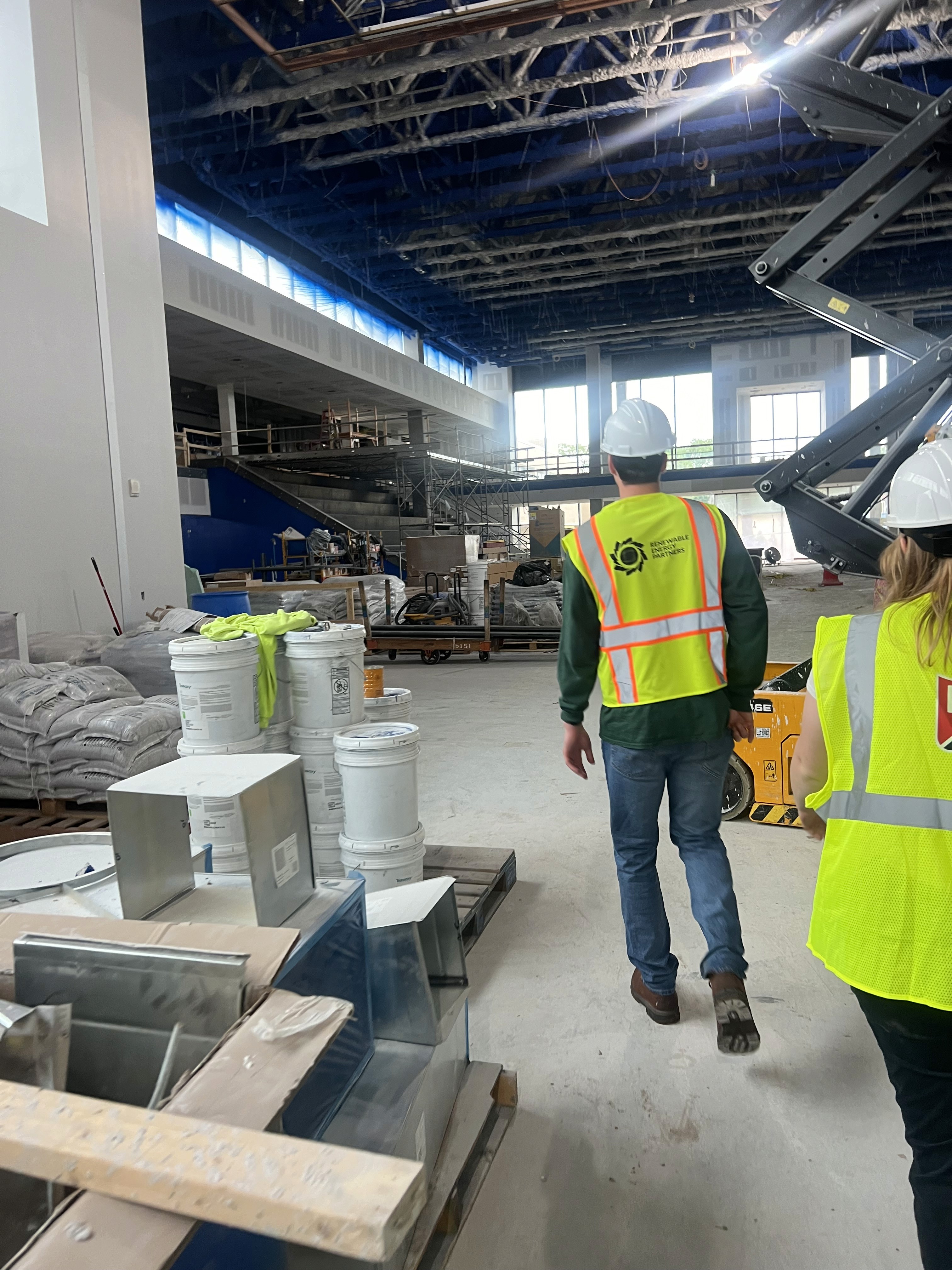 Worker installing solar panels