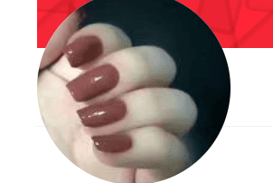 The image shows a close-up of a hand with long, glossy brown nails, shaped smoothly and rounded for an elegant look.