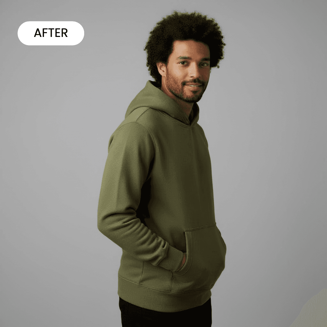 green hoodie on a mixed race man standing in a grey professional studio facing the side