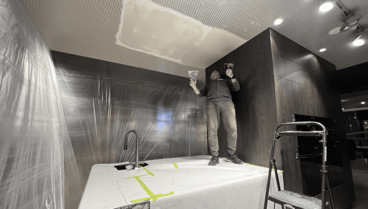 person sitting in a chair in front of a man