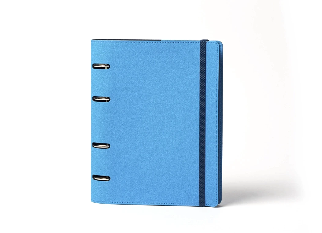 Front view of blue ring binder journal with elastic strap