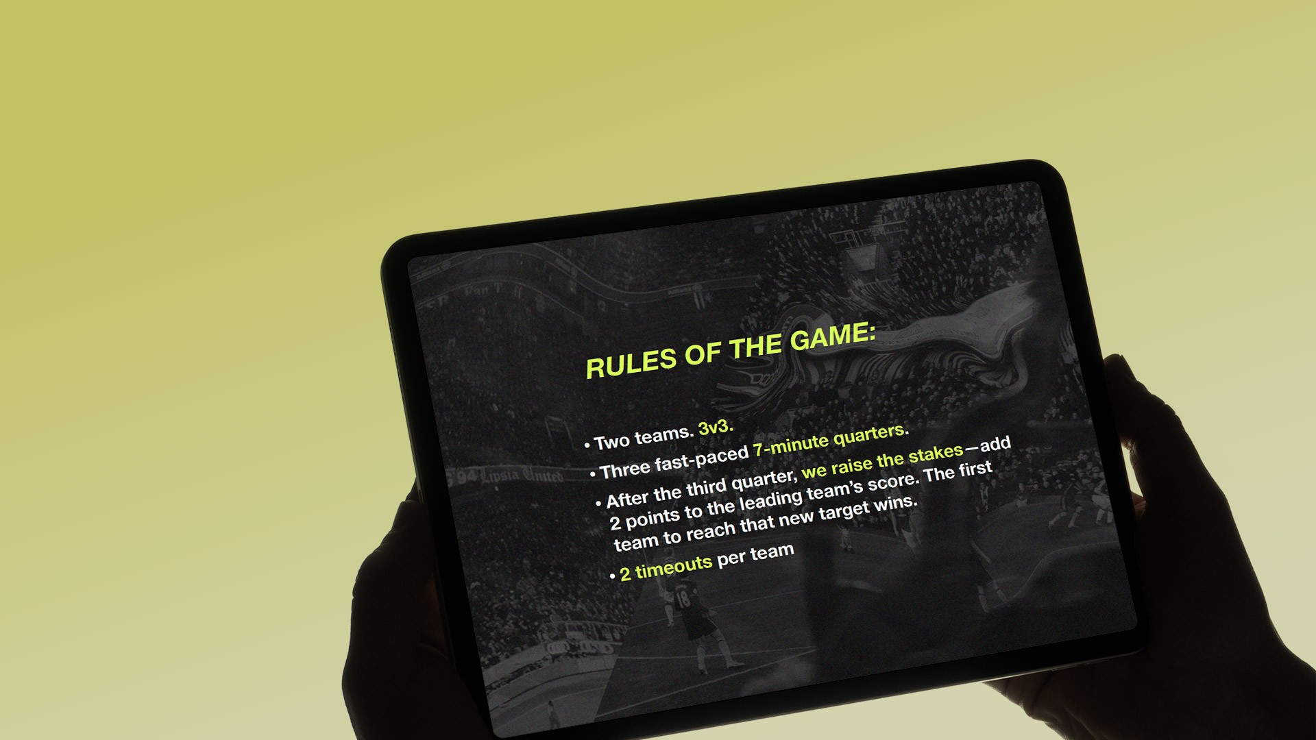 Hands holding a tablet displaying a Nike pitch presentation slide outlining game rules through bold typography, high-contrast layouts, and dynamic sports-inspired visual storytelling.