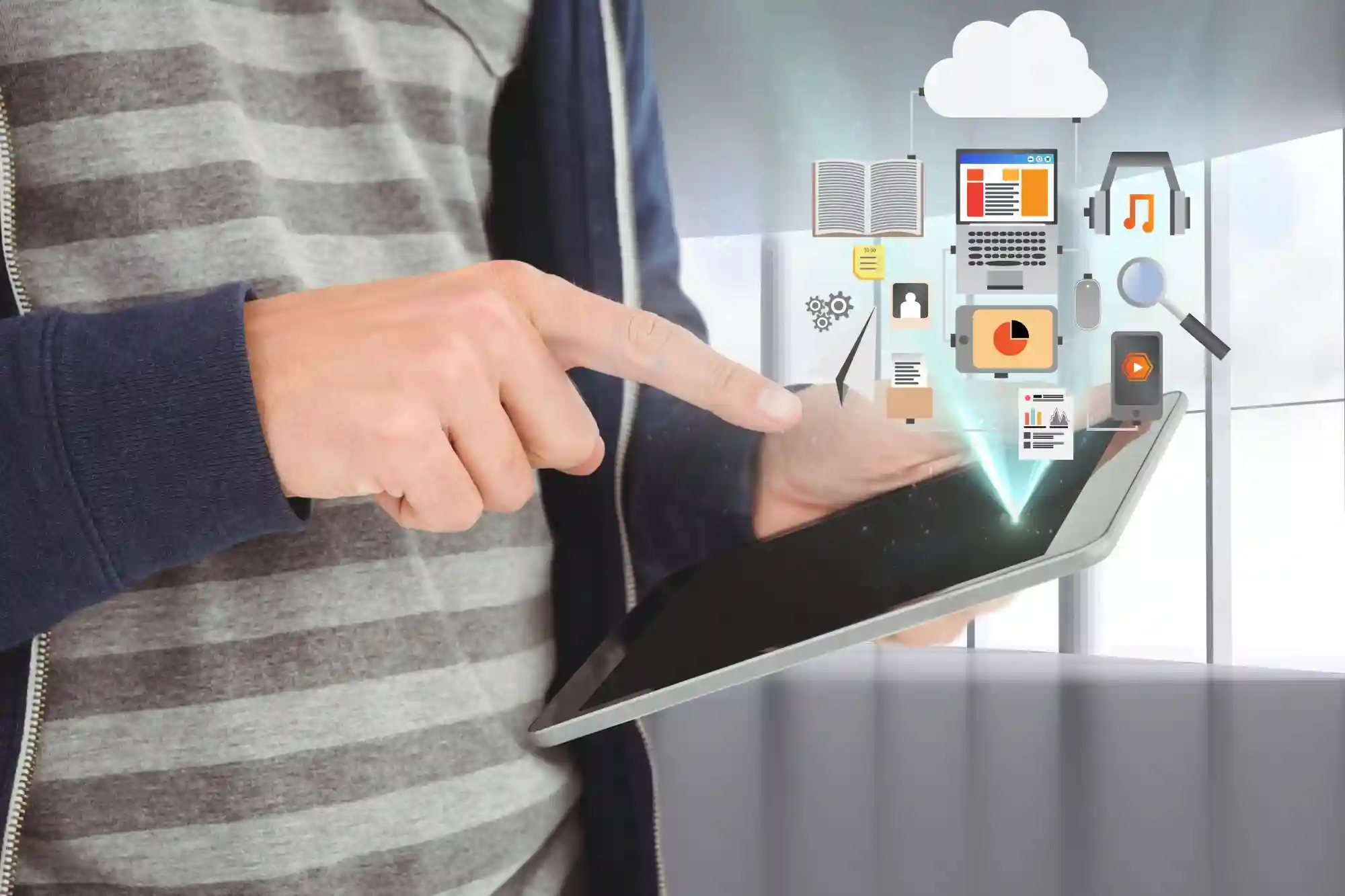 A person using a tablet that displays various floating digital icons representing cloud computing and interconnected business data.