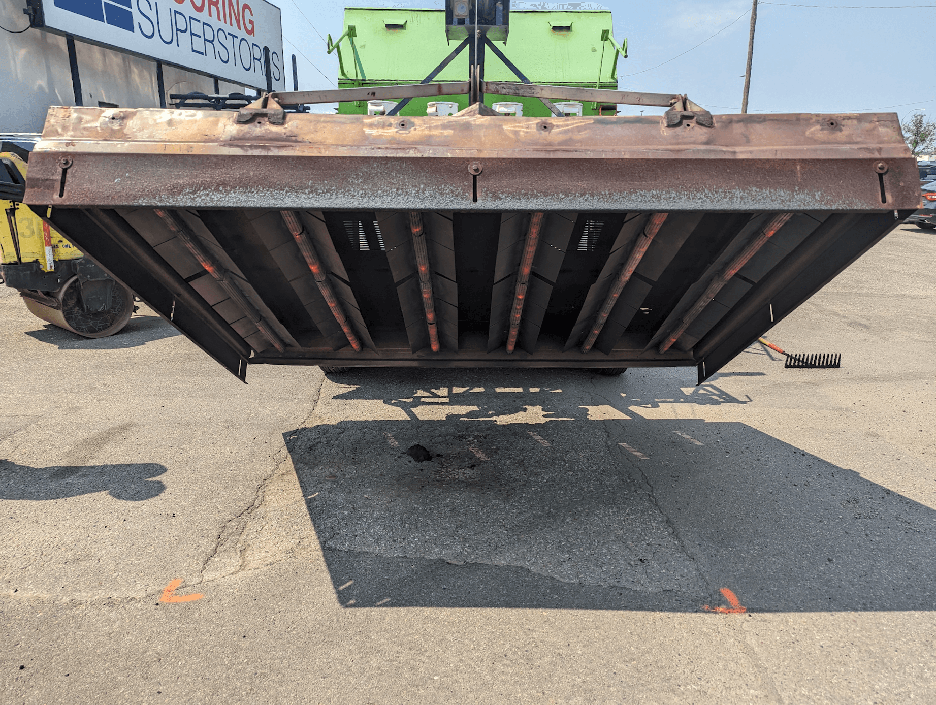 HeatWave Asphalt infrared trailer with heater chambers used for pavement restoration and surface repair