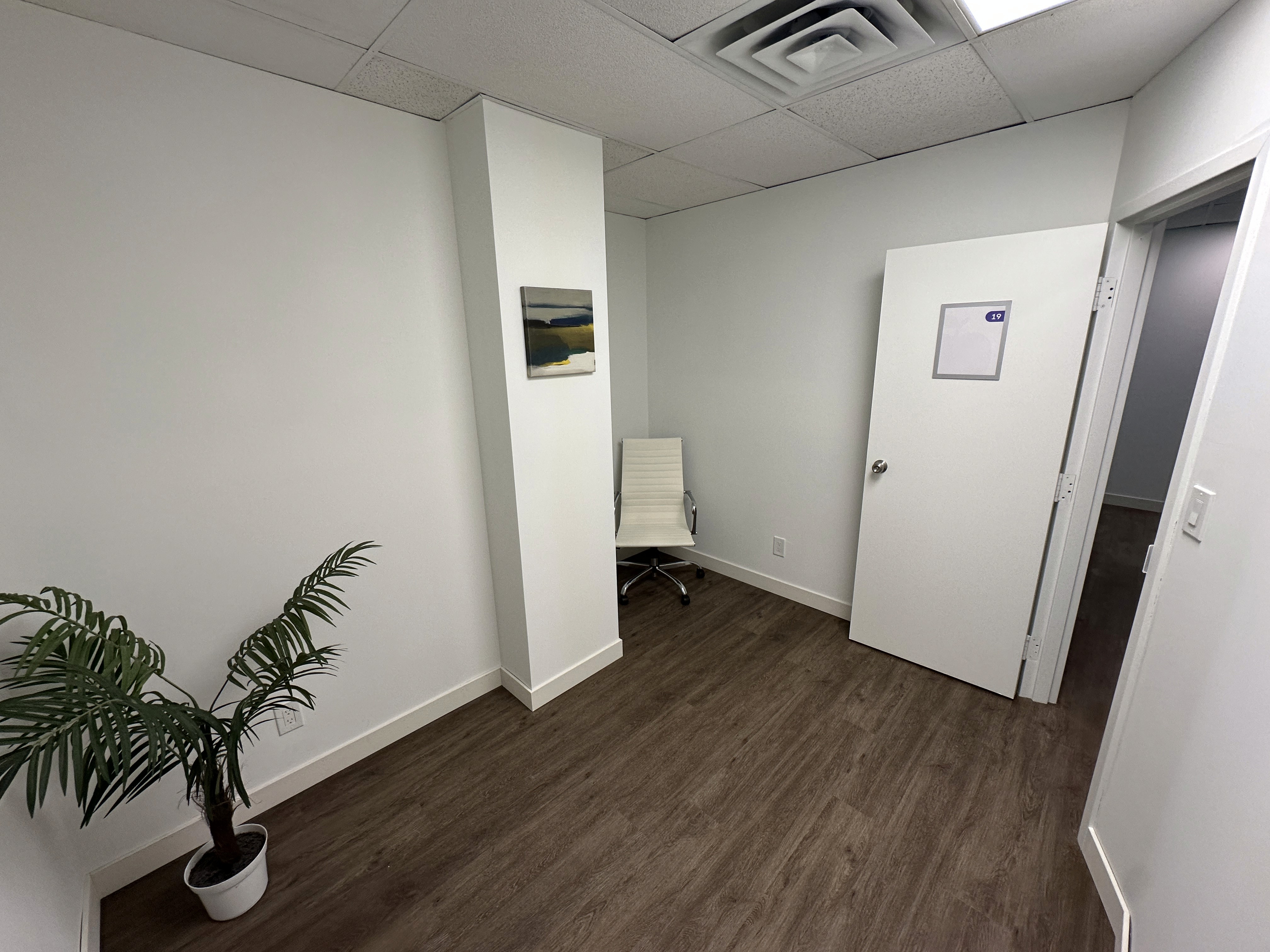 a doctor showing a patient something on the tablet