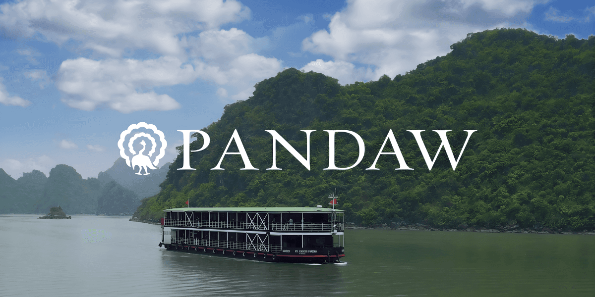 "Pandaw river cruise ship navigating Southeast Asia's scenic waters, offering luxury, cultural immersion, and authentic travel experiences."