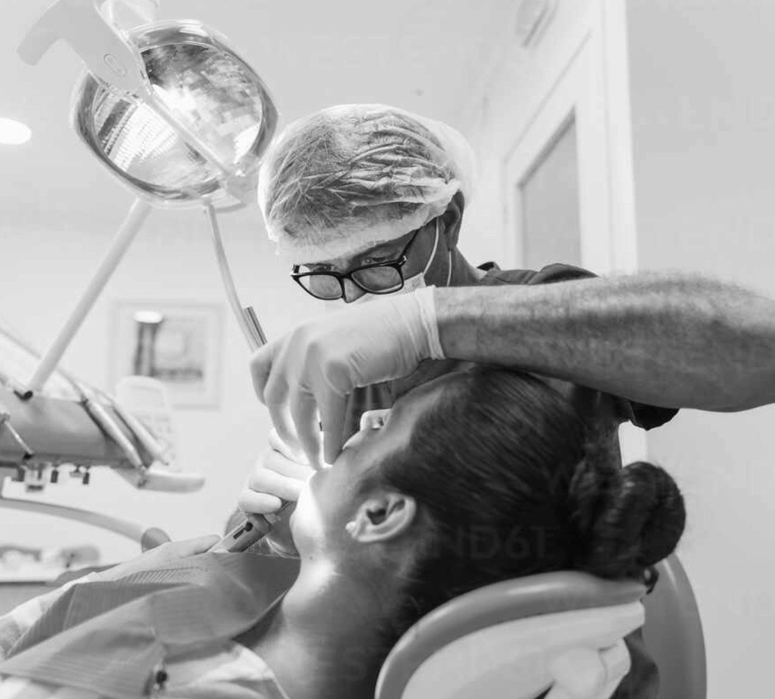 A team of surgeons in the middle of an operation