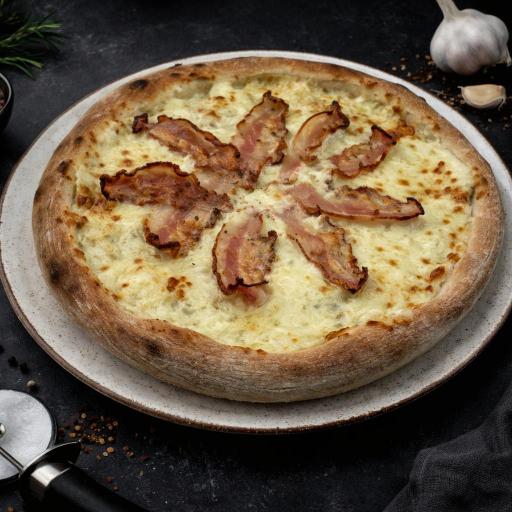 pizza with green leaf vegetable