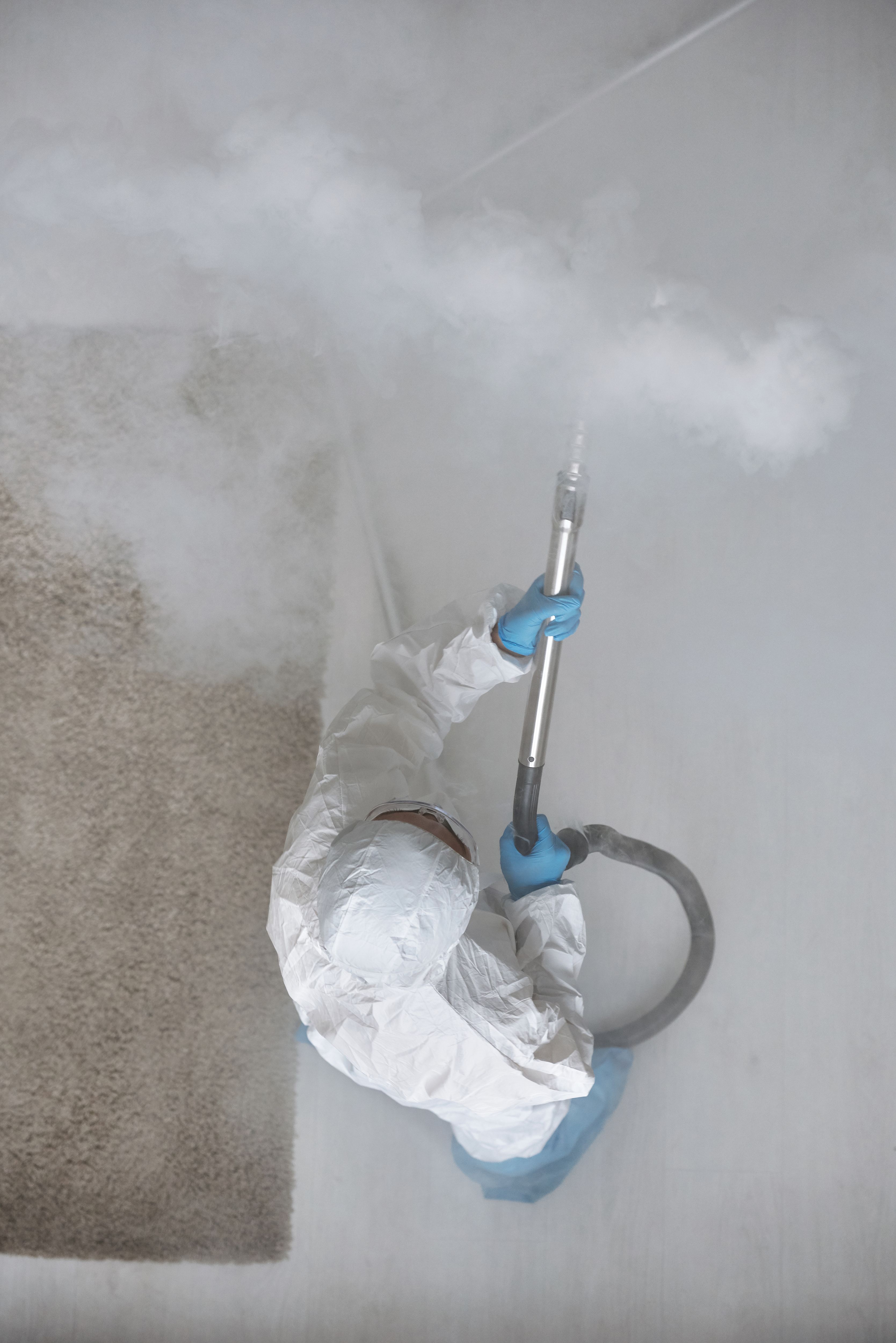 Remediation professional preparing a property for safe cleanup