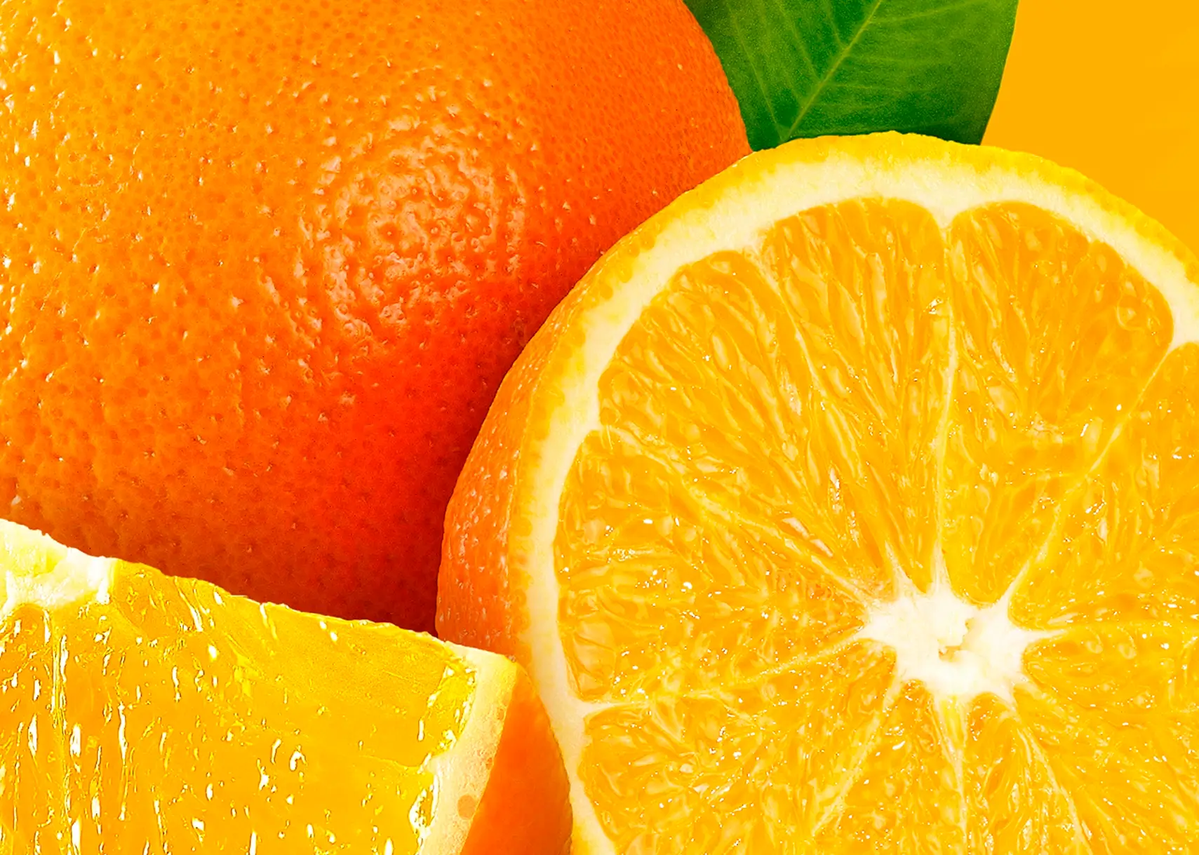 High-resolution macro shot of sliced fresh oranges highlighting the juicy texture and skin details for food packaging design.