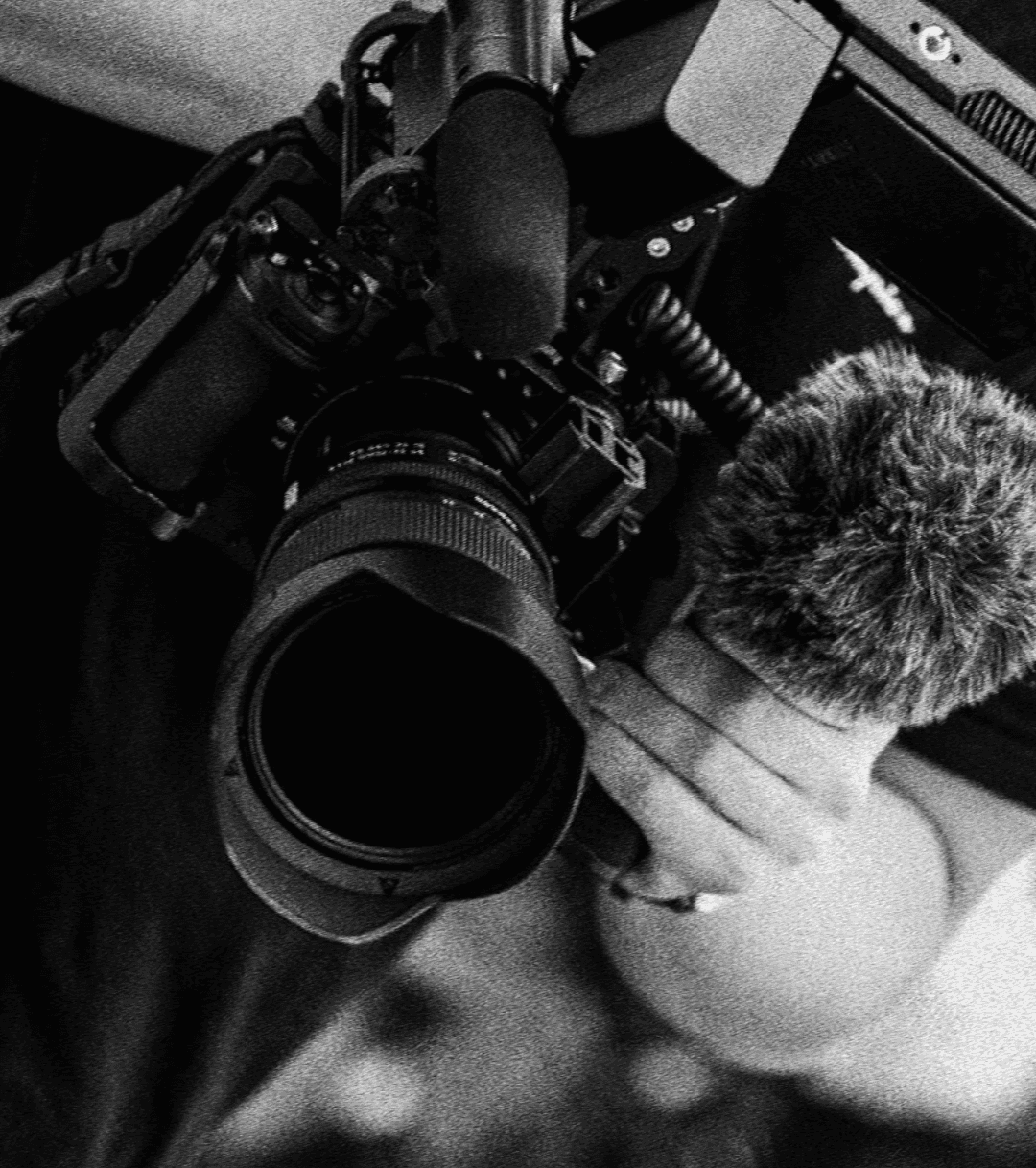 Black-and-white image of a camera mounted on a rig