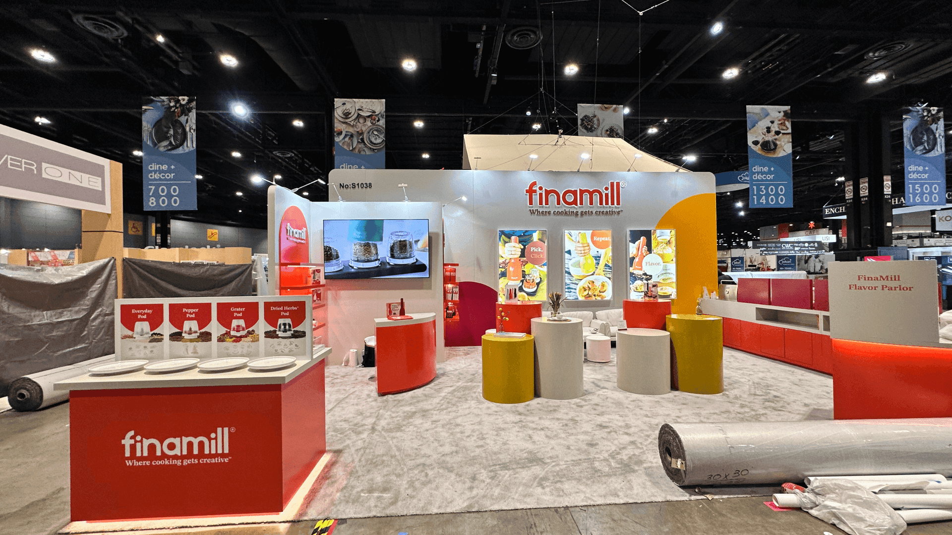 Specialty food and beverage booth at Las Vegas Convention Center with sample station, back-stock storage, and merchandising wall