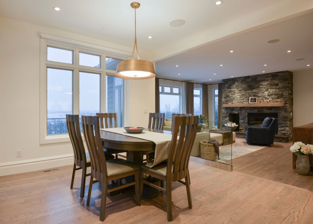 Image of Luxury dining room with fireplace, part of KHD Homes design-build interior design and construction projects.