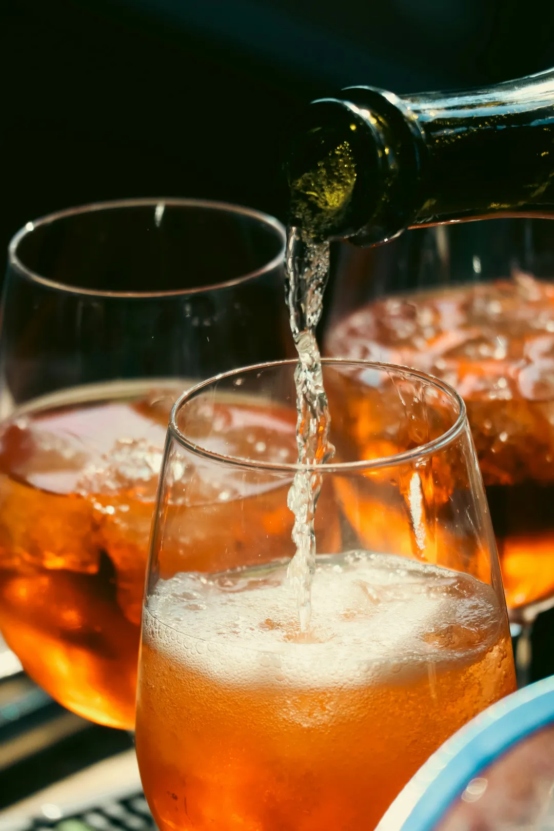 Cocktail being poured into a glass