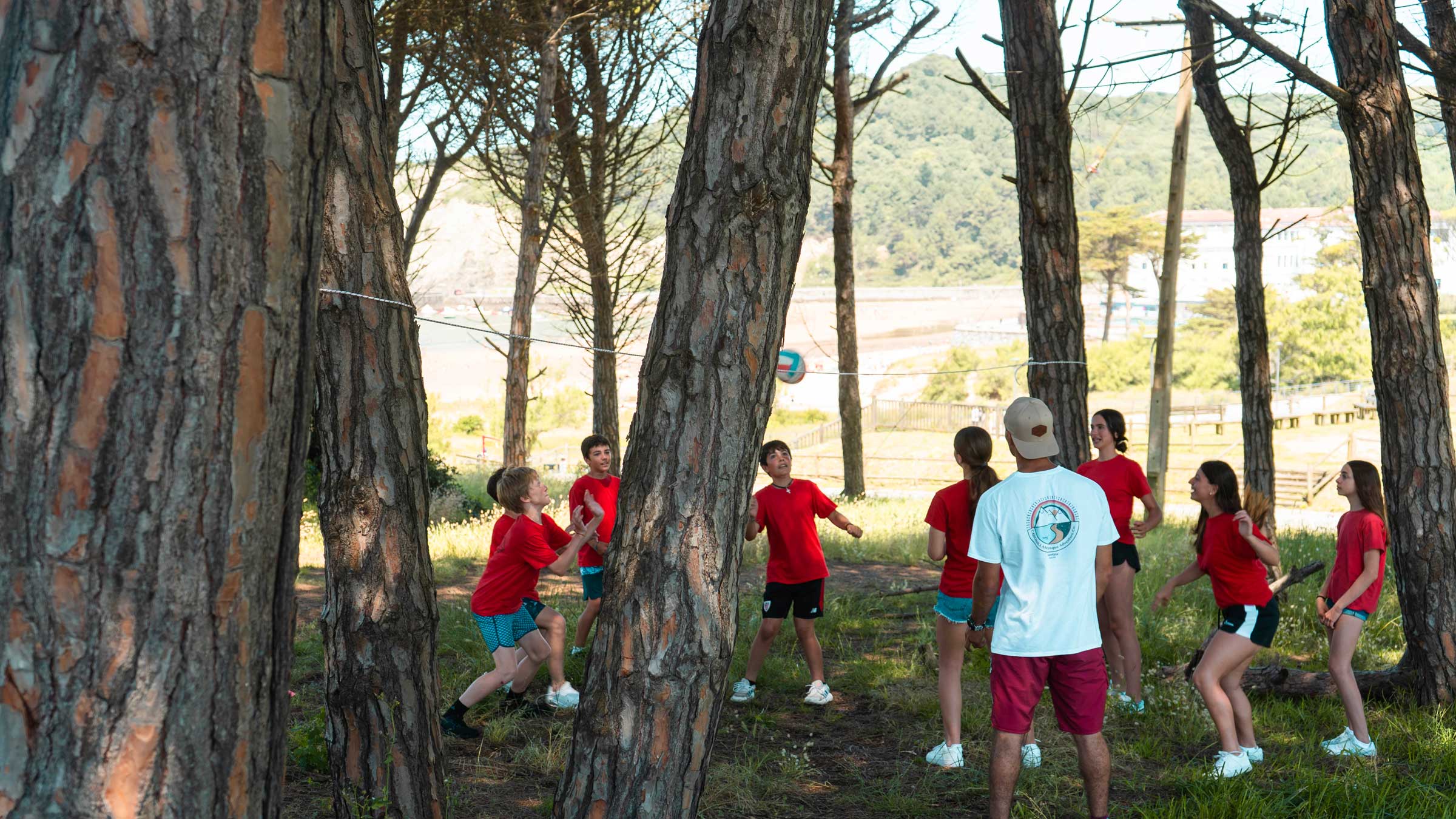 Group of men standing with Sufboard
