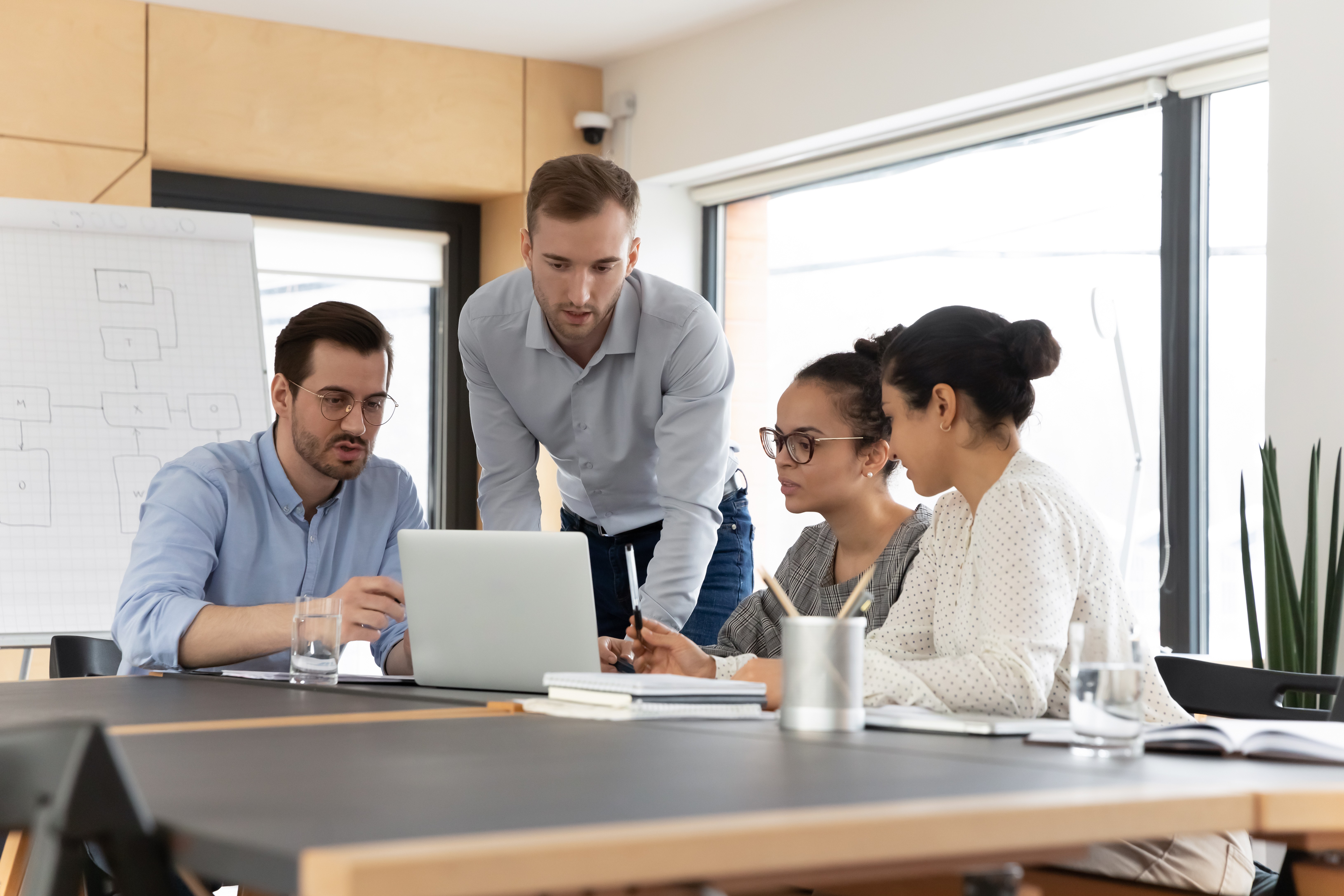 team workspace with people working