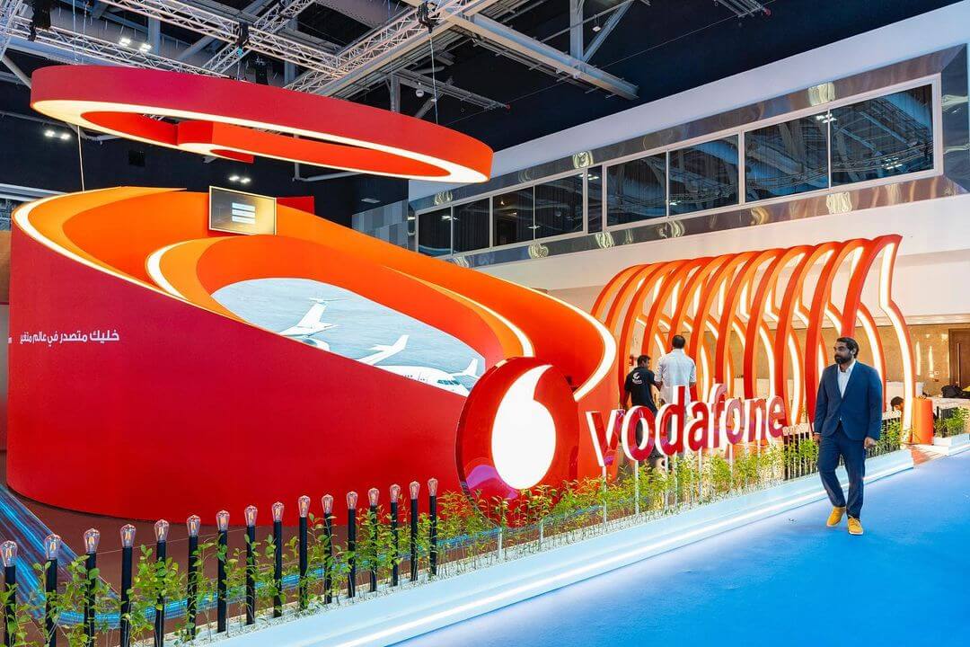 Booth design and interactive installation for Vodafone at COMEX Oman 2024 by RenaiXance.