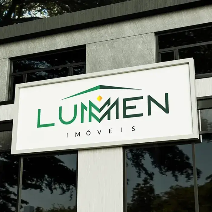 Aplicação em fachada de estabelecimento do logo que criei para a Lummen Imóveis