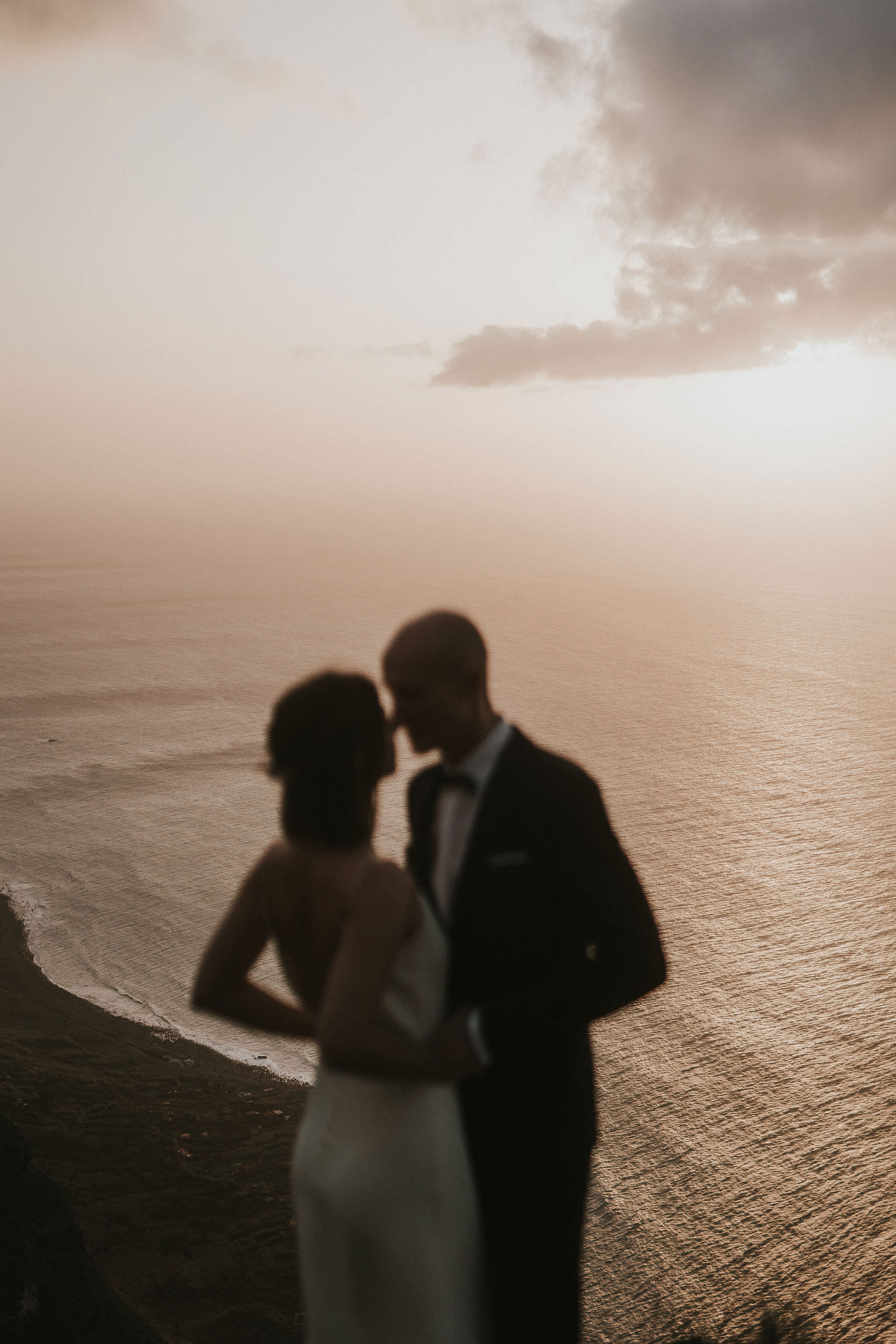 Madeira Elopement couple at sunset with Atlantic ocean coastline