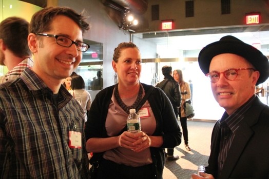 photo of two men and a woman