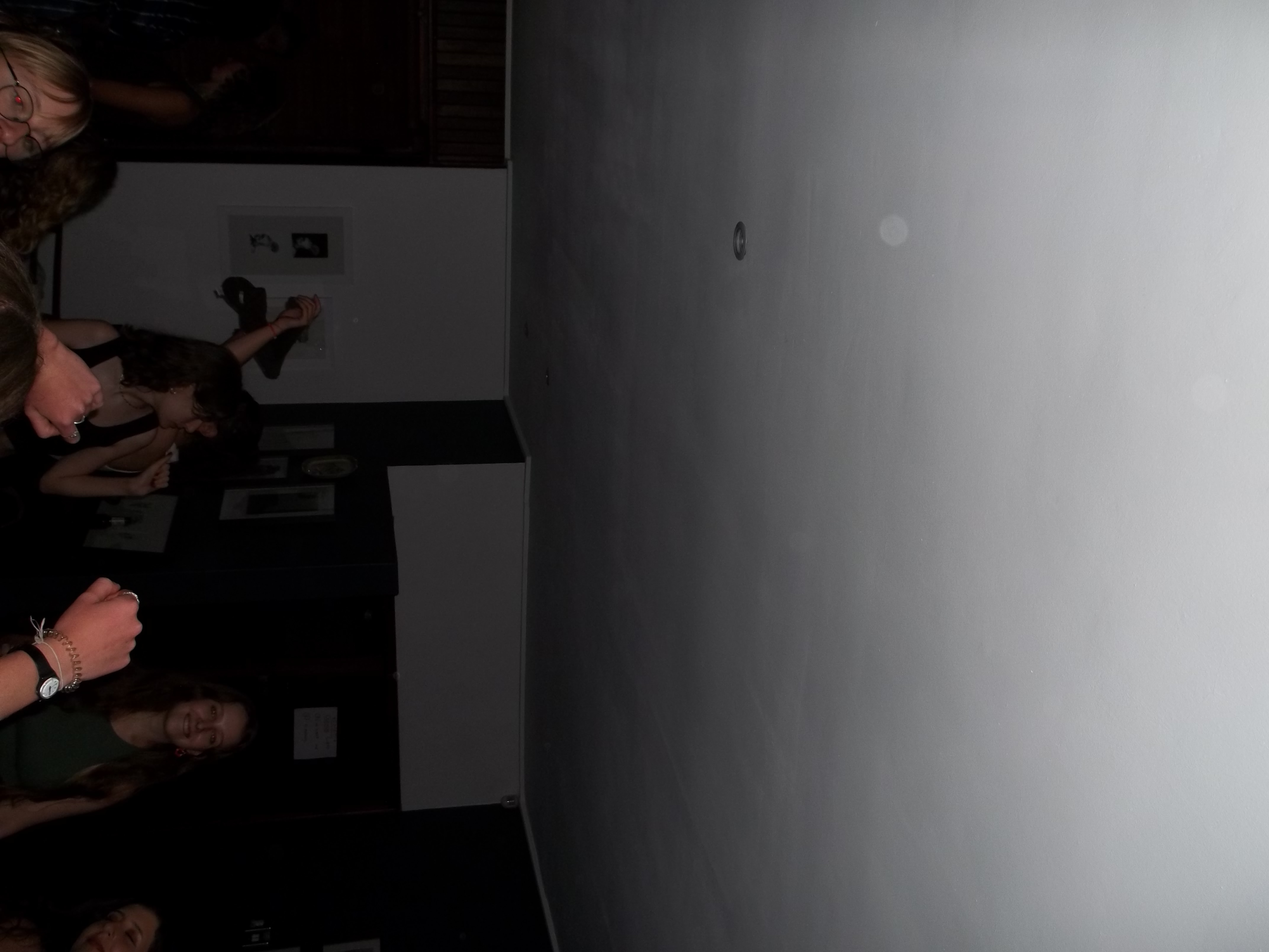 A group of people sitting around a living room