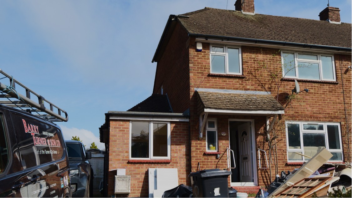 Exterior view of semi-detached property in Kent undergoing side and rear extension works