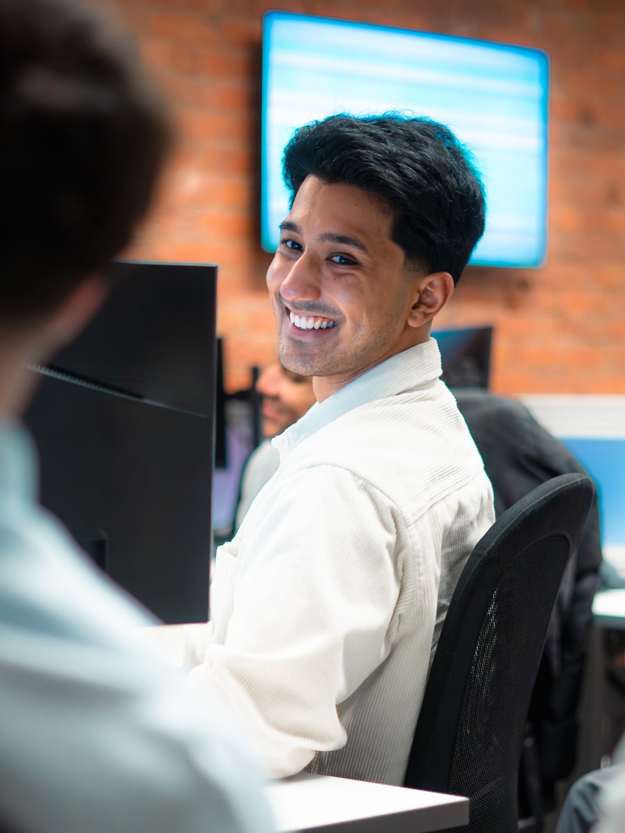 A PSS Tax adviser at their desk in the Manchester office
