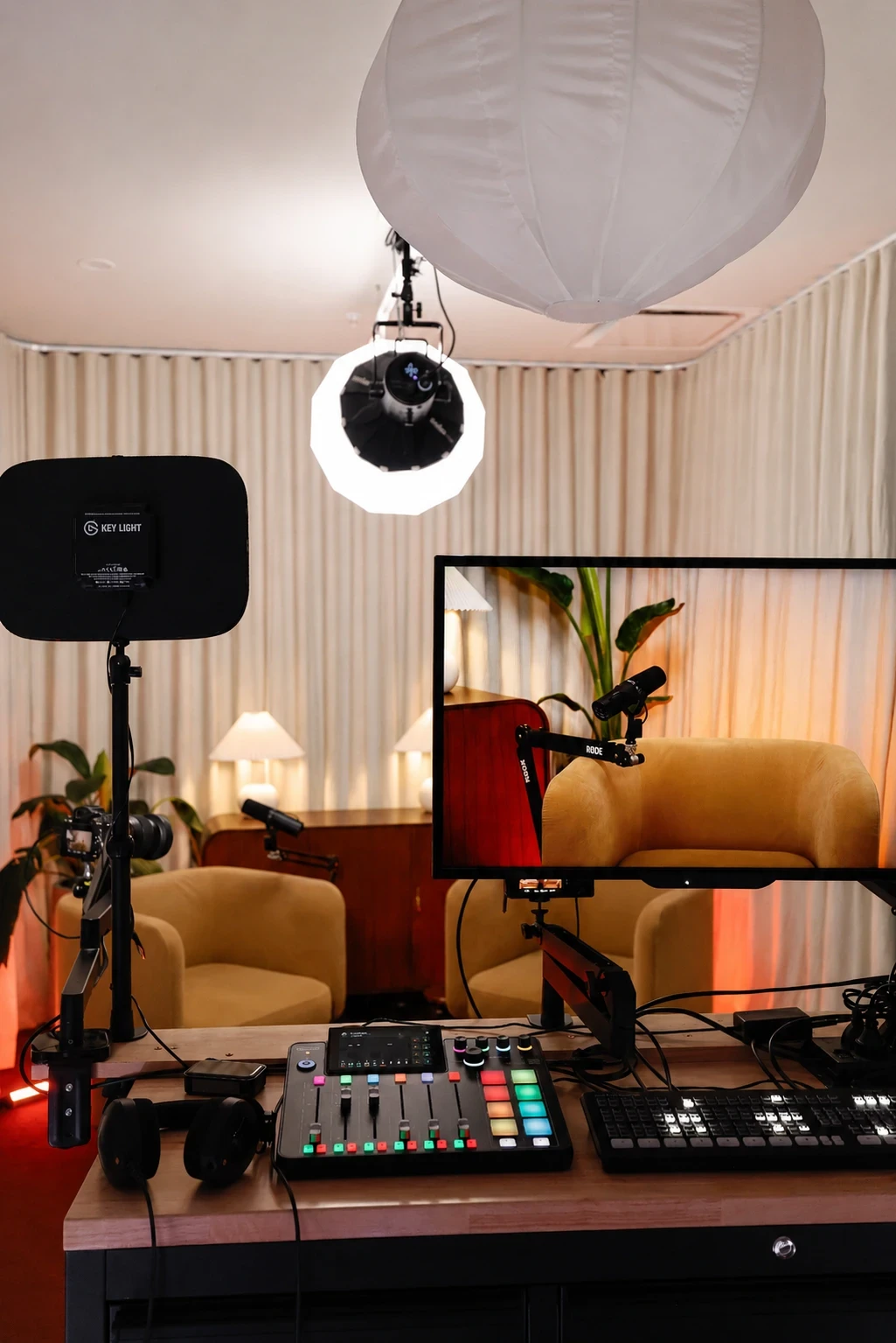 The COVE set shown on multi-camera monitors behind a mixing desk during setup