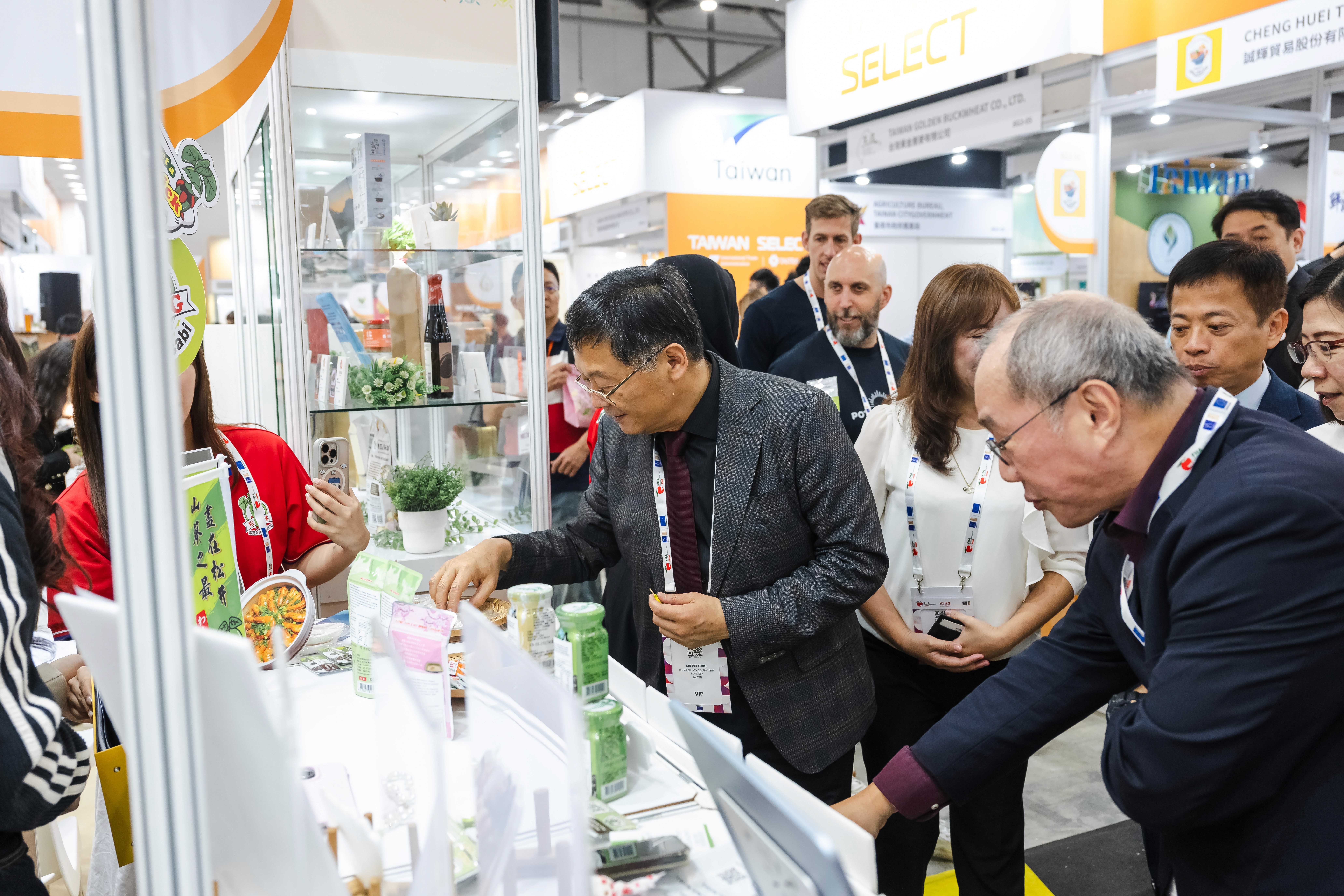 Massive and modern Taiwan Pavilion production design at FHA Food & Beverage 2026 inside Singapore EXPO, featuring custom trade booths and active B2B buyer networking
