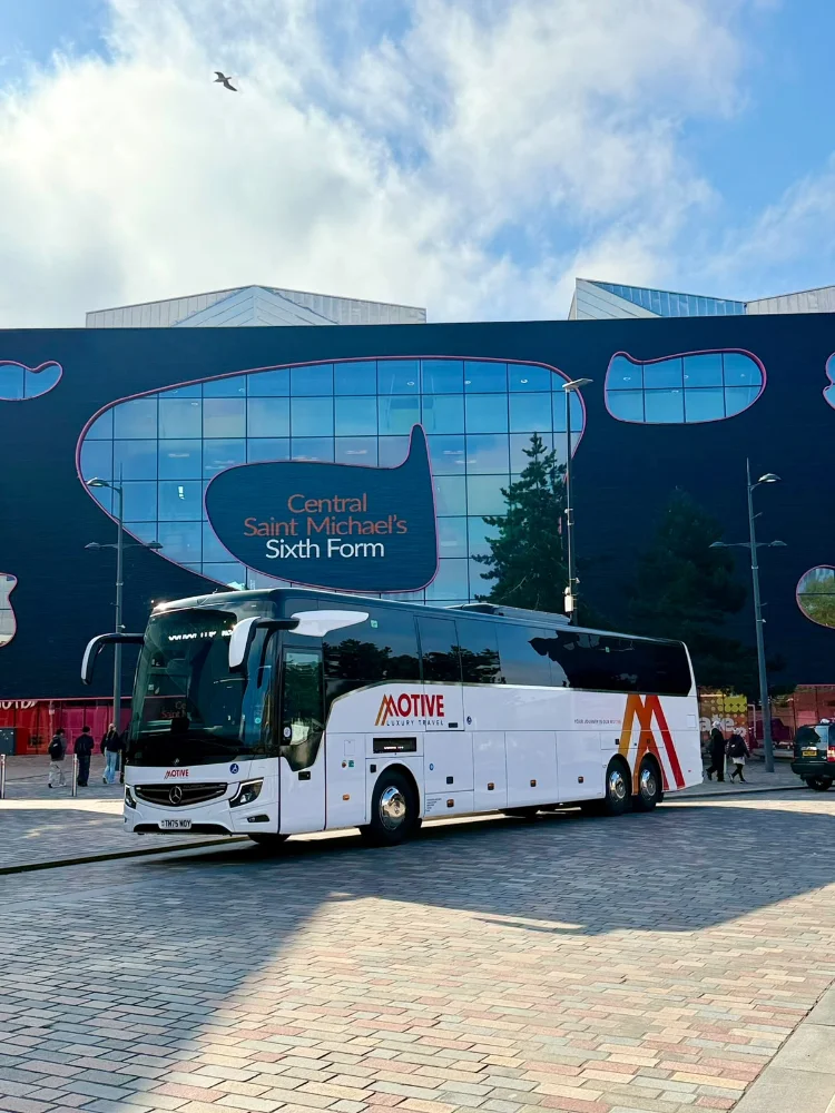 Luxury coach and minibus fleet used for city tours and private transfers, showcasing premium travel services and modern design in urban and scenic environments