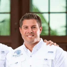 a man smiling for the camera