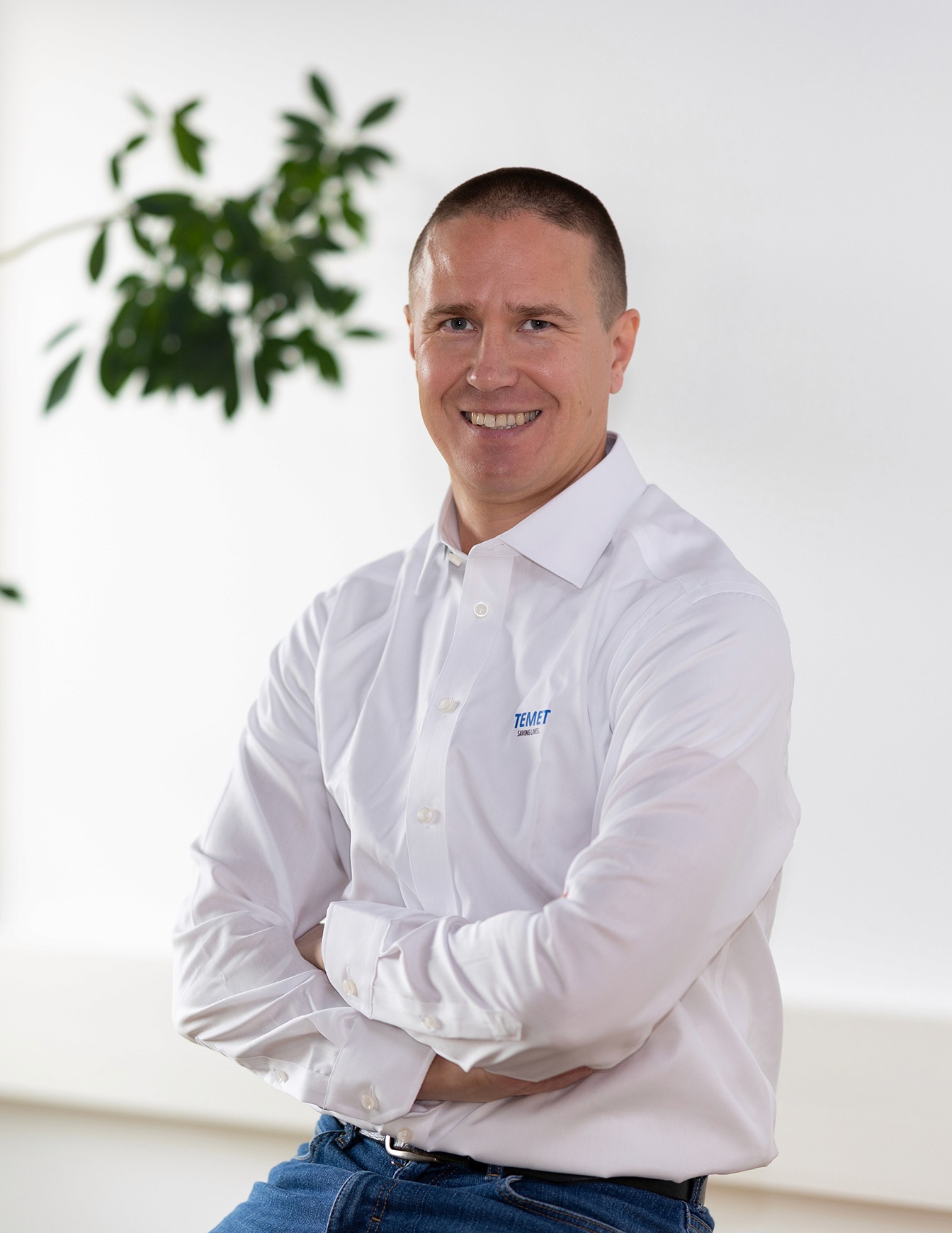 Portrait of John Doe Anderson, CEO of Omnis.