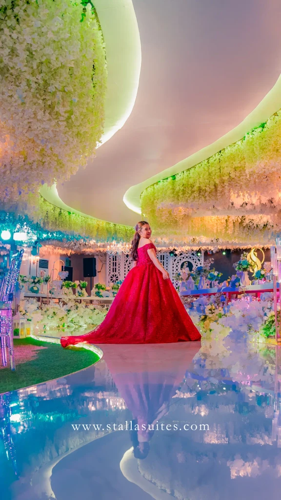 Debutante in red on the pearl dance floor of Celestia Hall, Stalla Suites QC