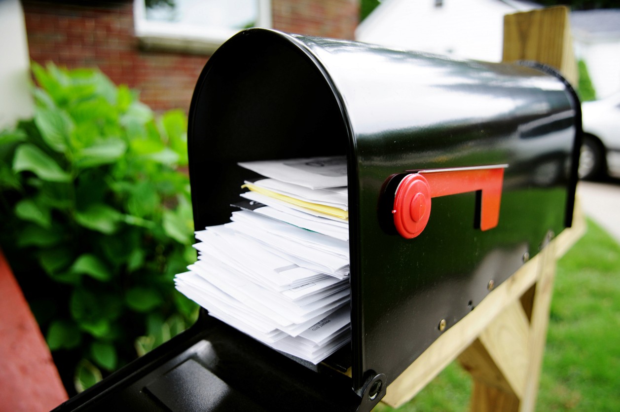 Open mailbox filled with mail
