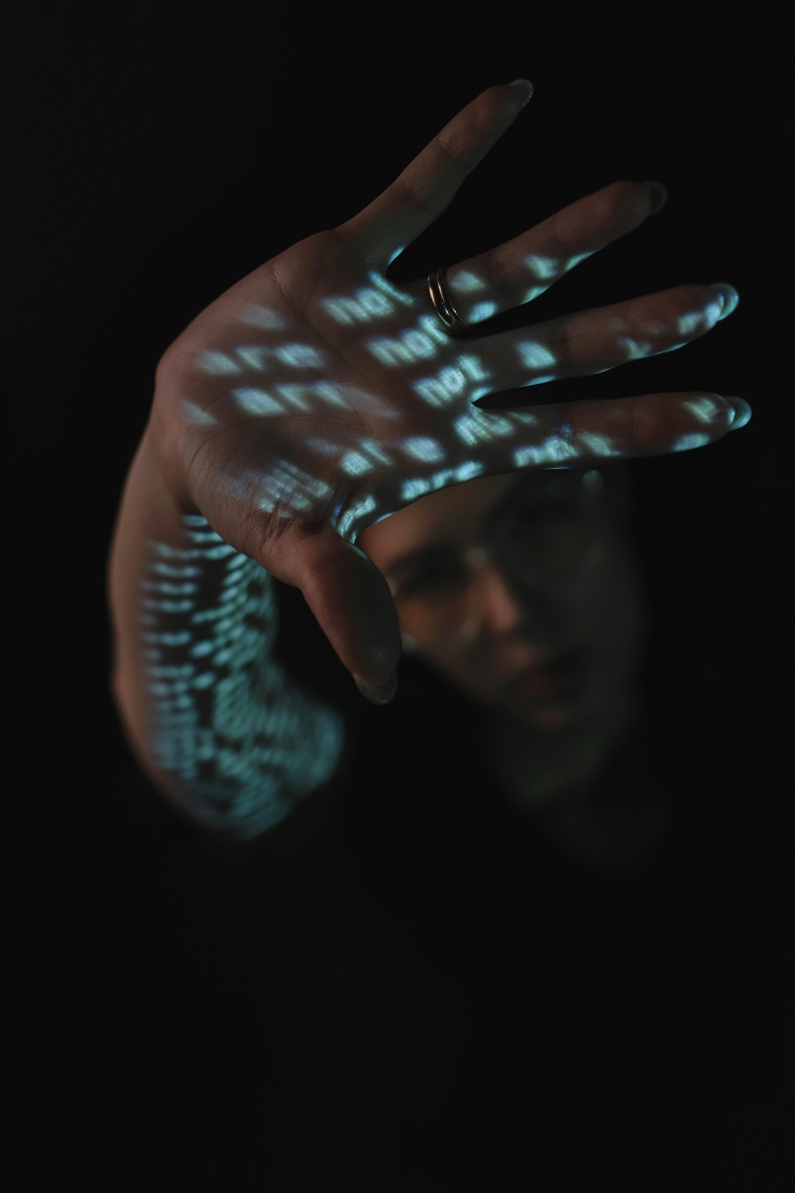 man holding white ceramic teacup