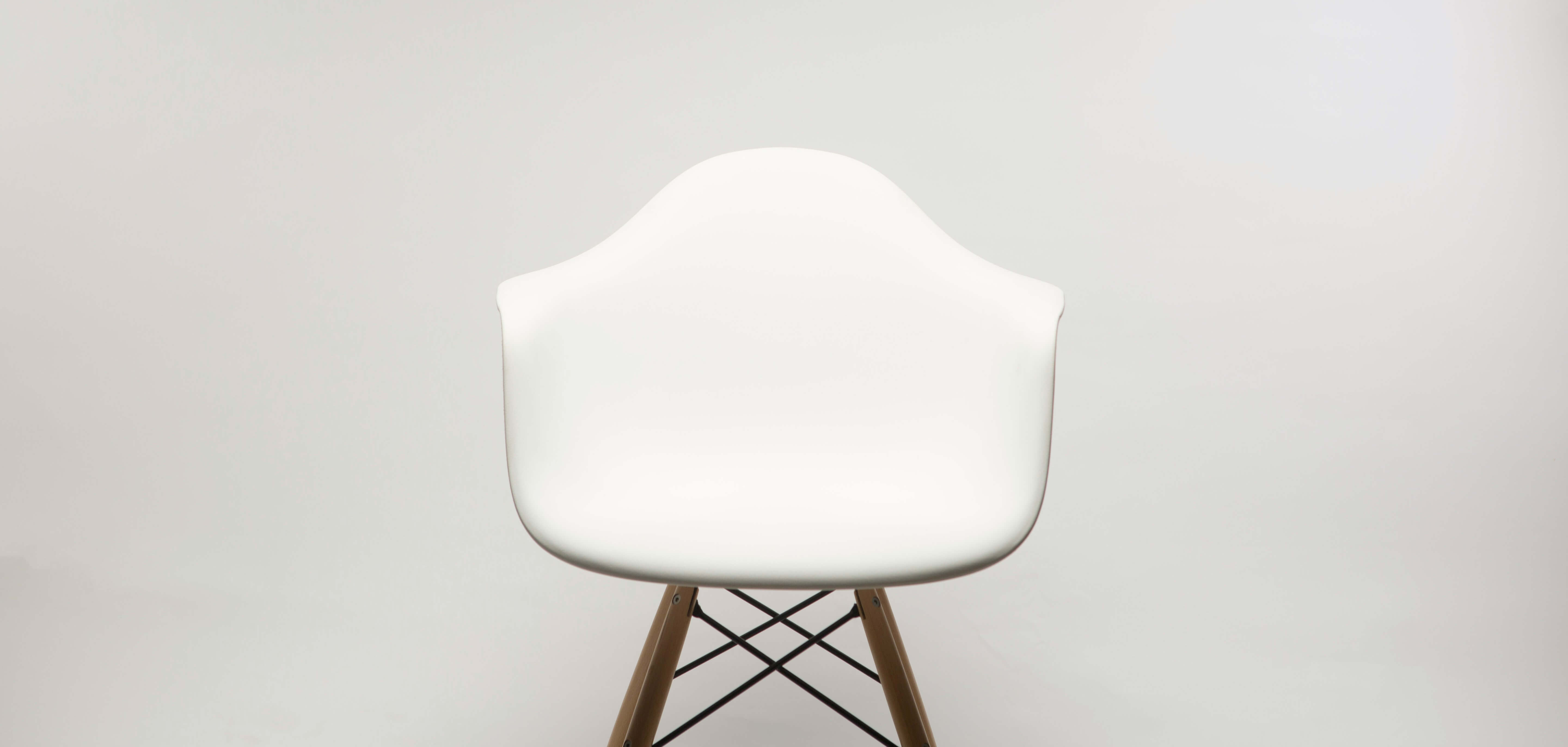 white wooden table with chairs