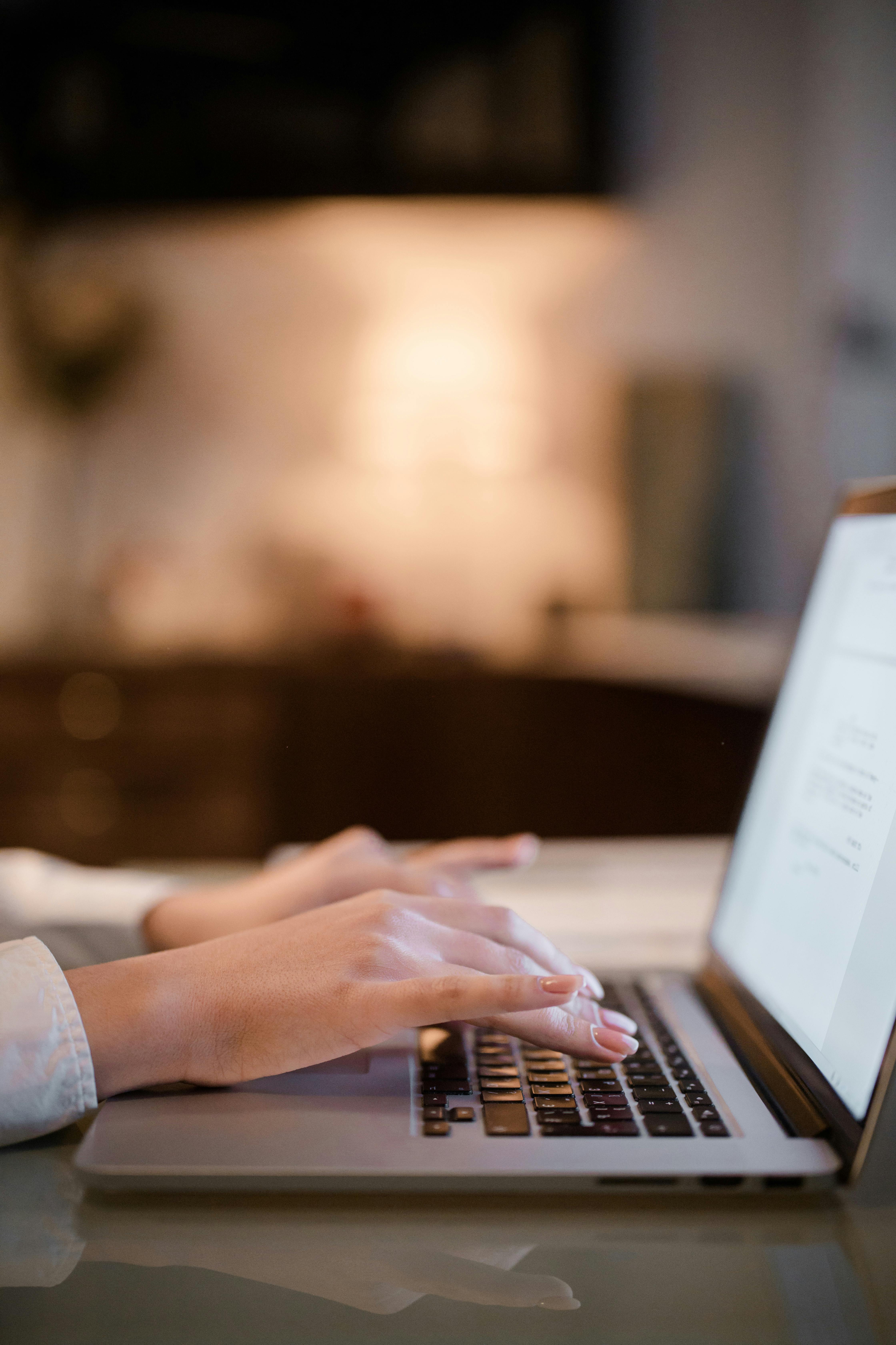 Image of someone working on a laptop to showcase services
