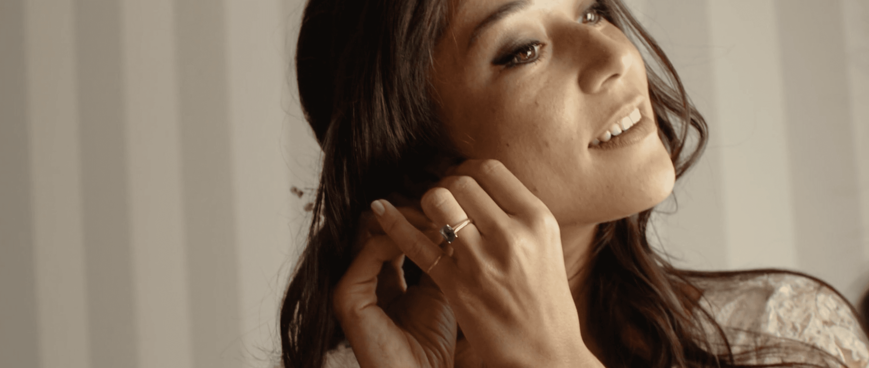 “Bride getting ready, adjusting her earring before the wedding ceremony. Close-up shot highlighting bridal beauty and wedding details.”