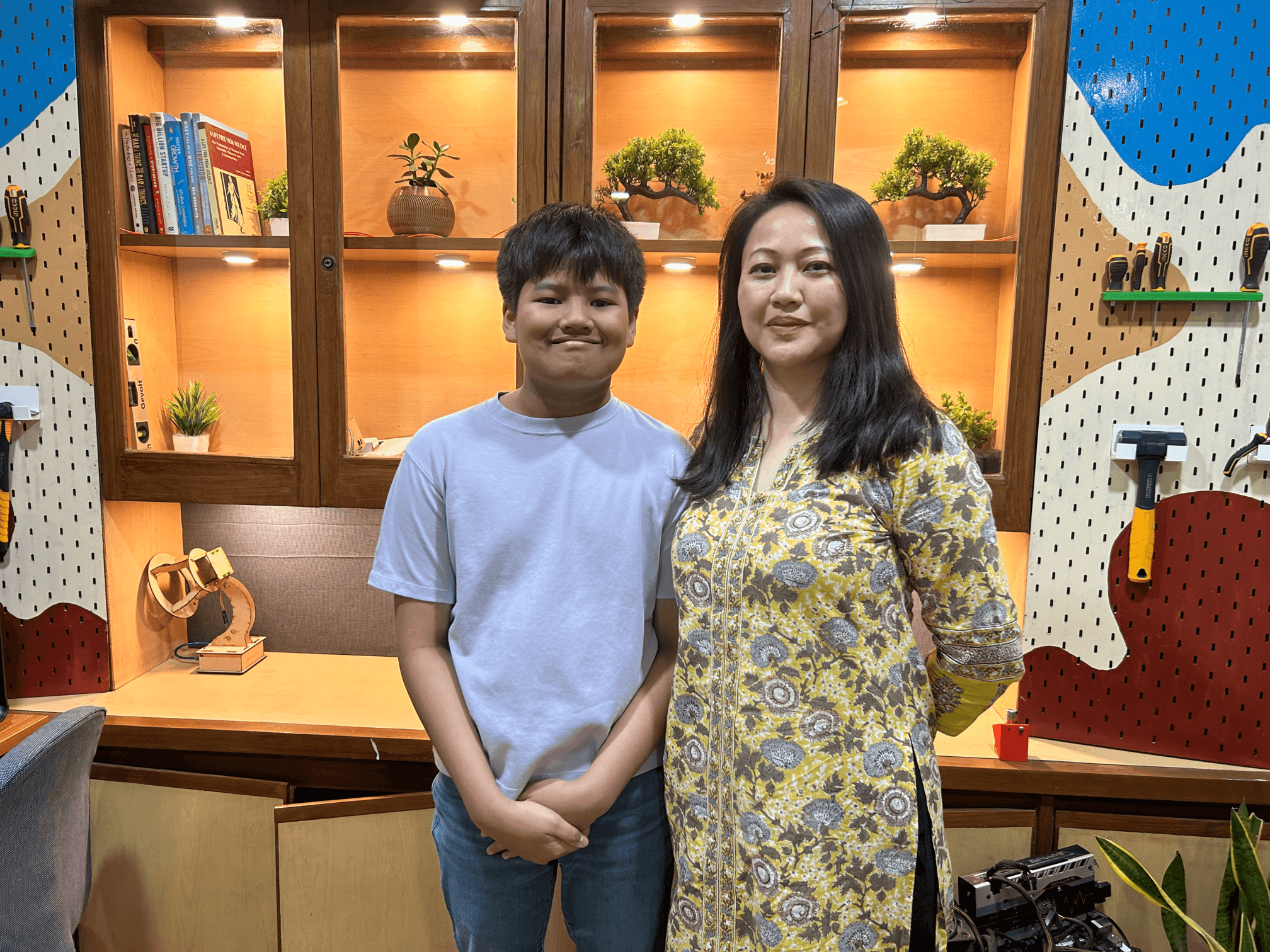 Green glass-metallic background with statistic cards