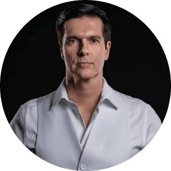 Woman participating in a virtual training session on a laptop