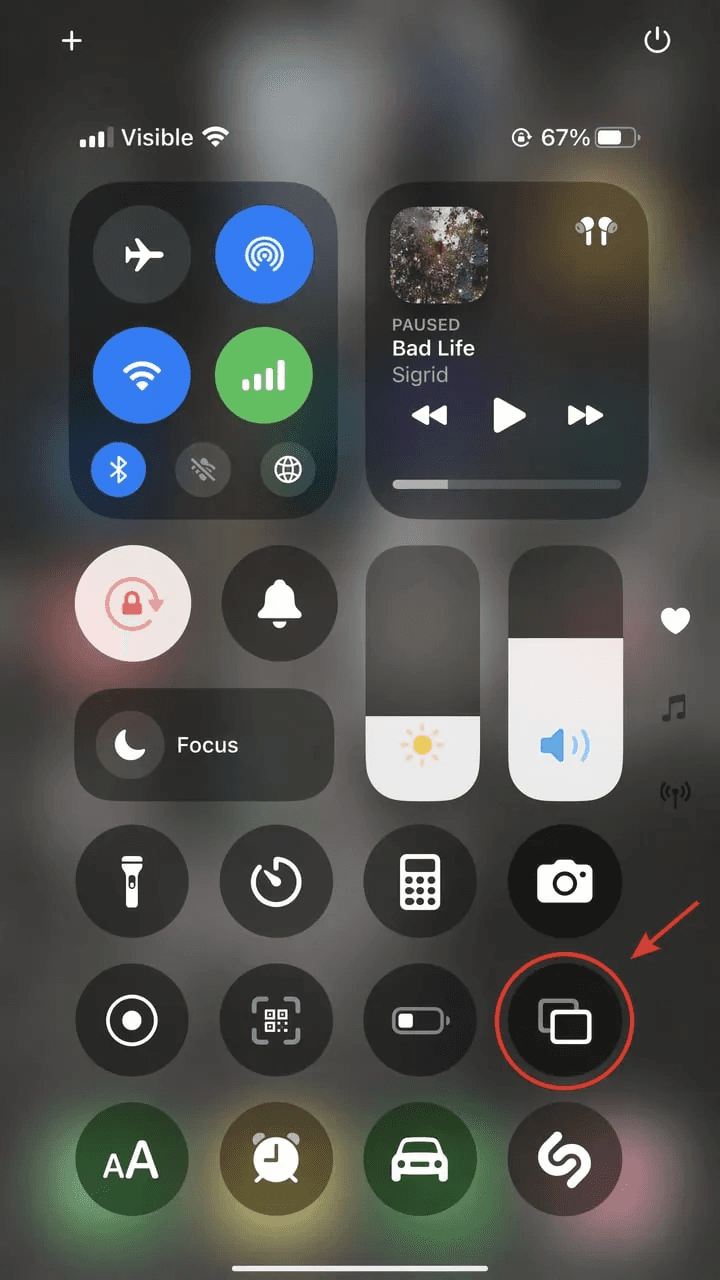 iPhone Control Center with the Screen Mirroring button highlighted