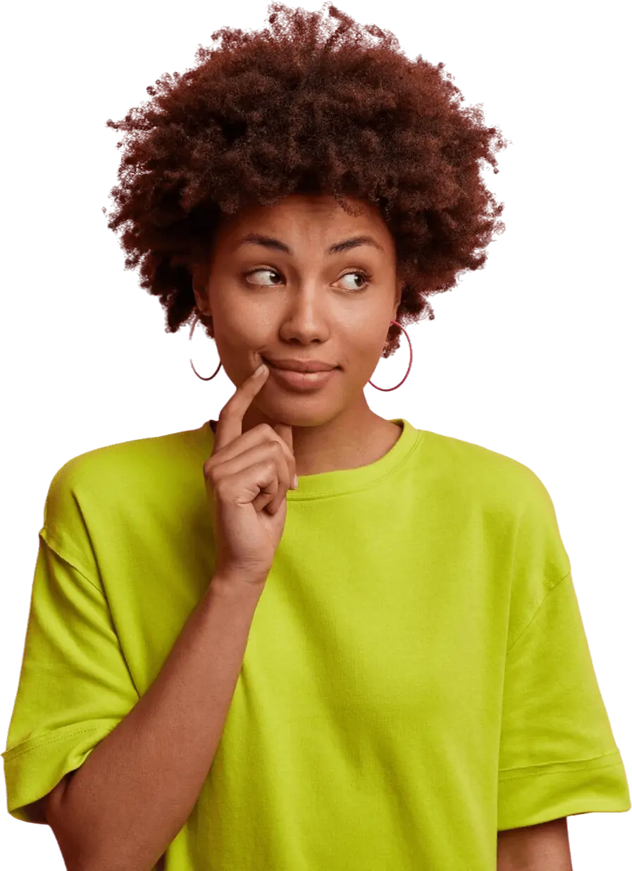 A woman with an afro is deep in thought, looking contemplative and engaged in her own reflections.