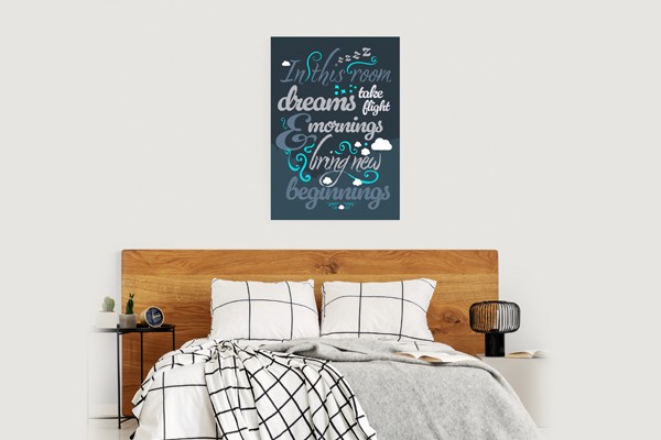 bedroom with quote poster on the wall