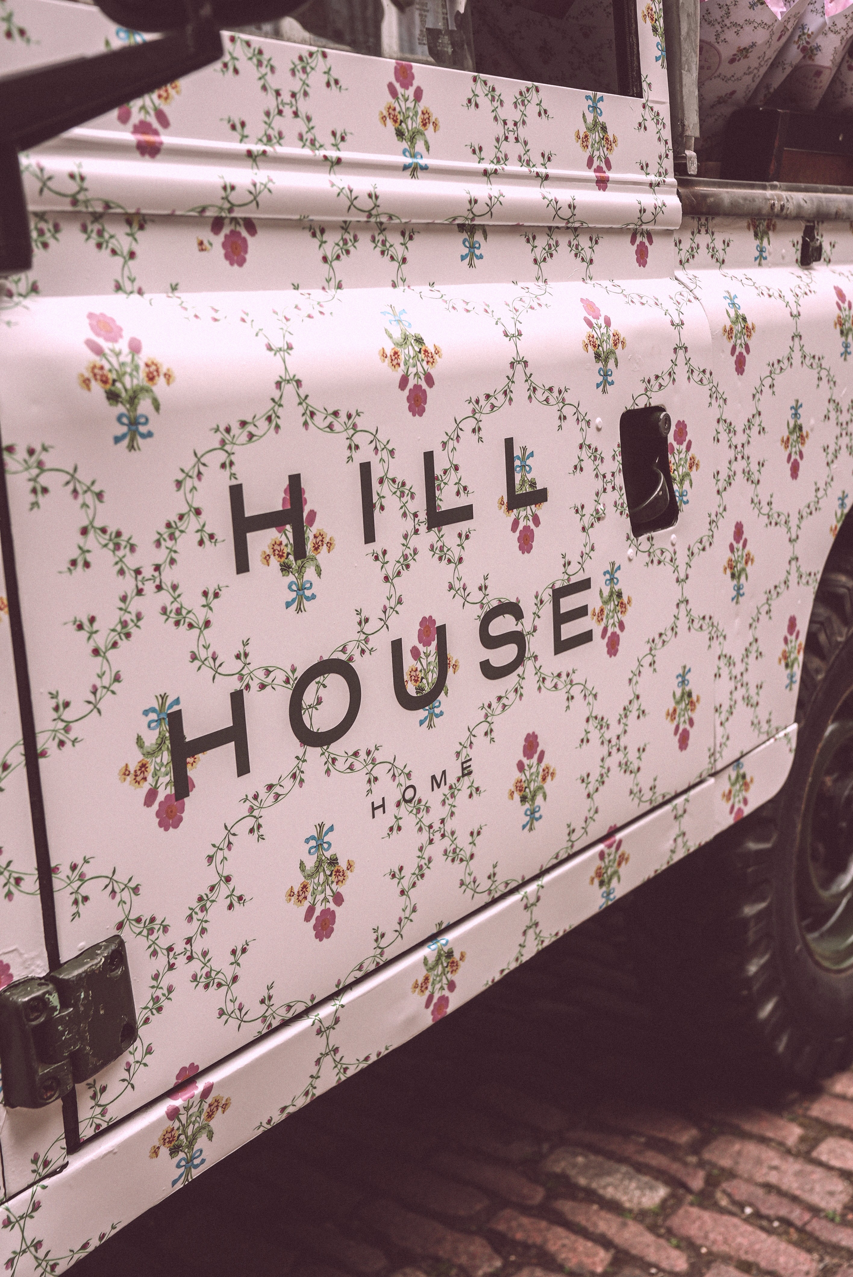 Close-up of bride and groom's torsos, bride in white dress