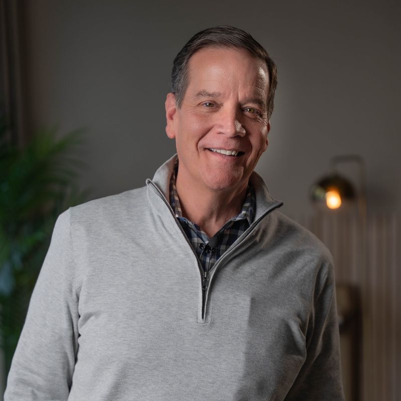 a group of people sitting at a table