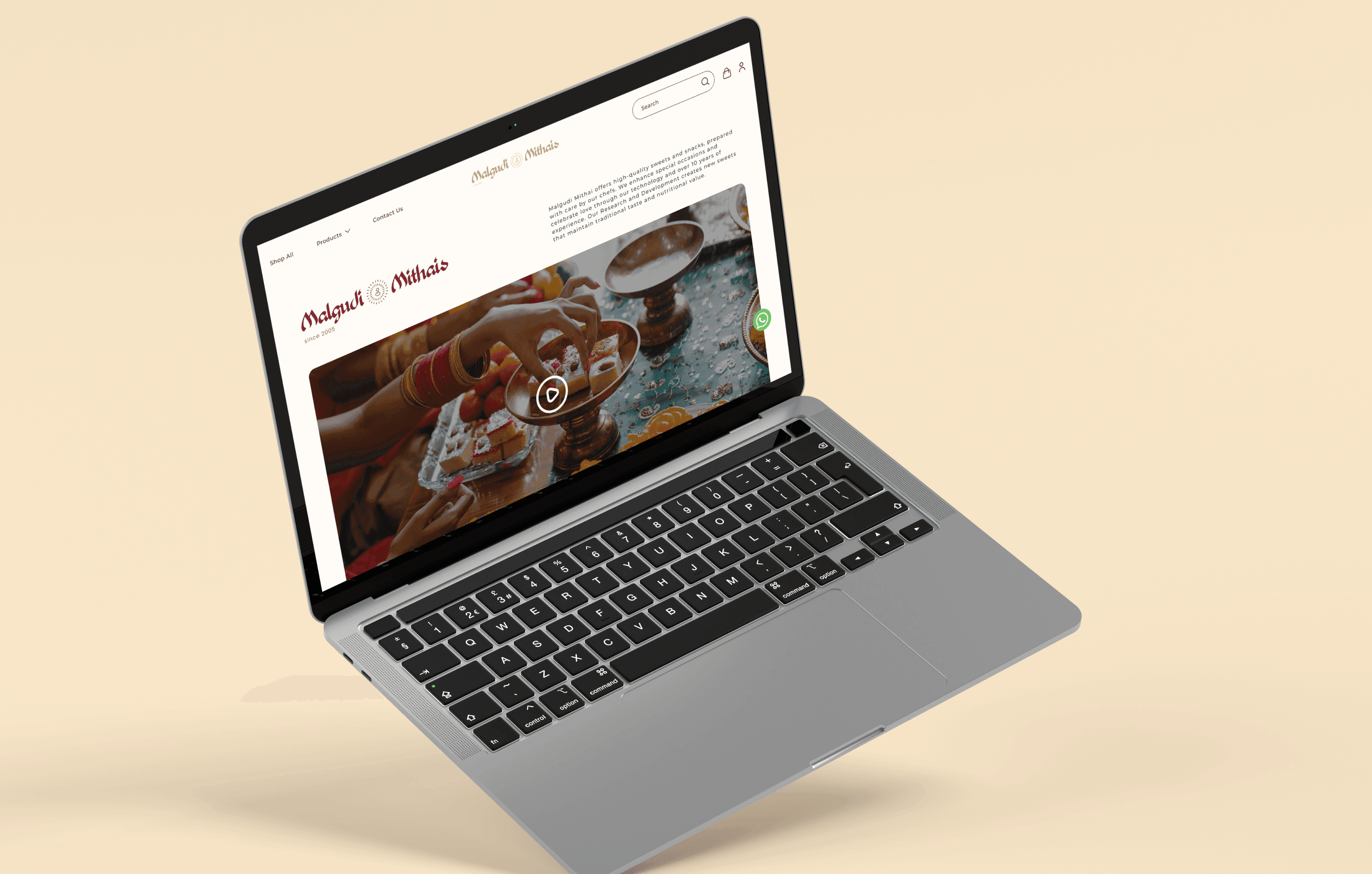 Malgudi Mithai website mockup displayed on a laptop screen, showcasing traditional Indian sweets and festive treats with an elegant design and vibrant product imagery.