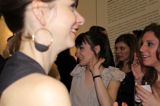 a snapshot of people at an exhibition